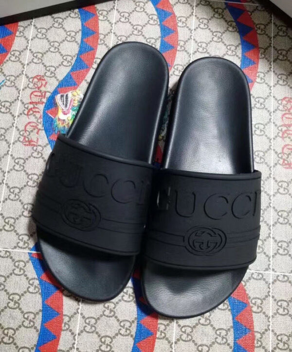 Gucci Unisex rubber GG slide sandal Black